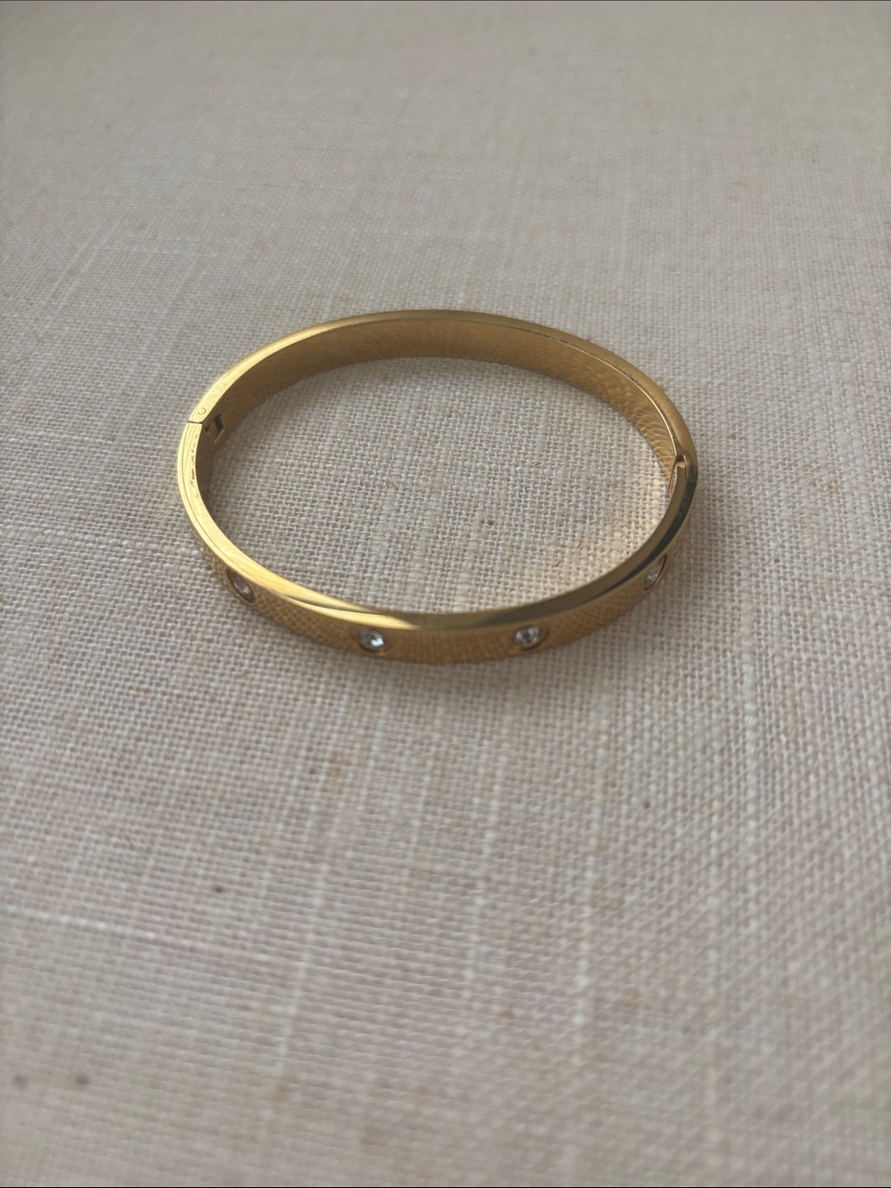 Gold Tone Crystal-Accent Hinged Bangle Bracelet